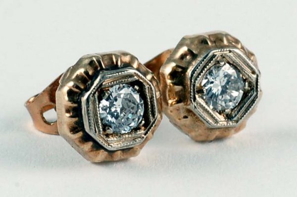 Appraisal: A pair of diamond stud earrings Each set with an