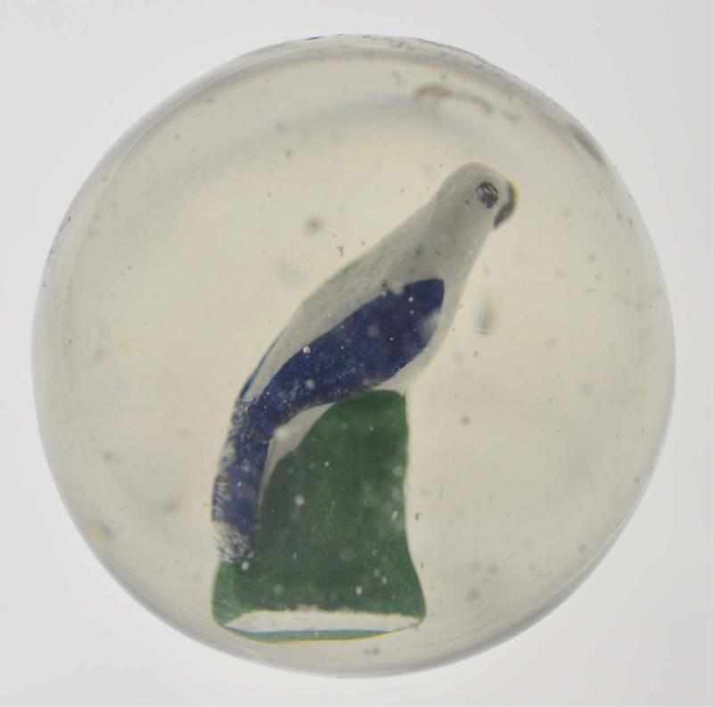 Appraisal: Bird on Green Stump Sulphide Marble Description With blue wings