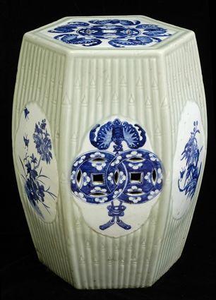 Appraisal: CHINESE CELADON-GLAZED HEXAGONAL BARREL-FORM STOOL The seat with pierced rondel