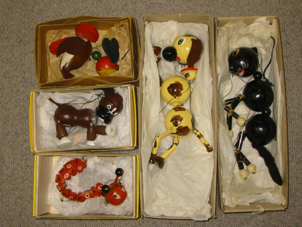 Appraisal: Five Pelham puppets comprising A Bengo Caterpillar in painted wood