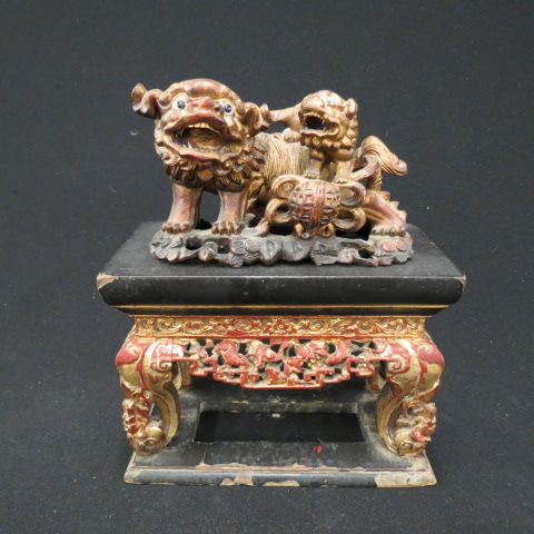 Appraisal: Chinese Carved Wooden Foo Dog Altarstyle stand stand is tall