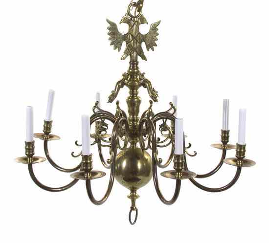 Appraisal: An English Brass Eight-Light Chandelier circa having a double eagle