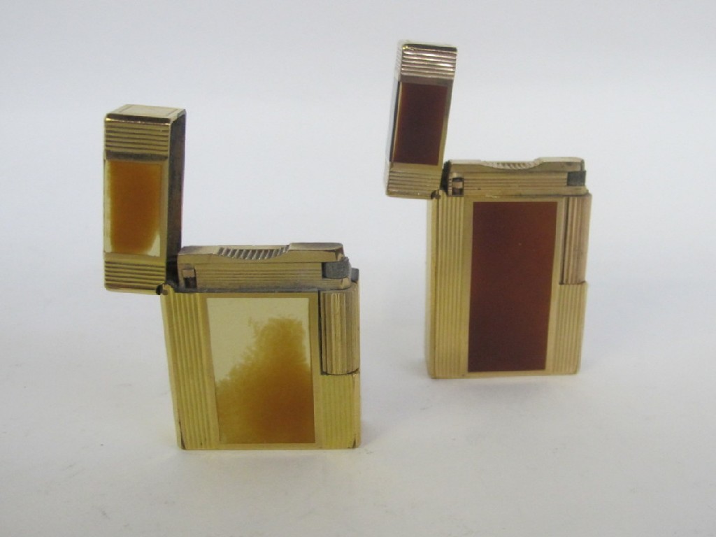 Appraisal: Lot comprising two Dupont cigarette lighters