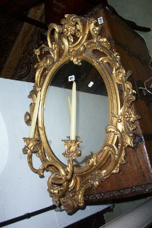 Appraisal: A good th century gilded Girondele with deep c-scroll and