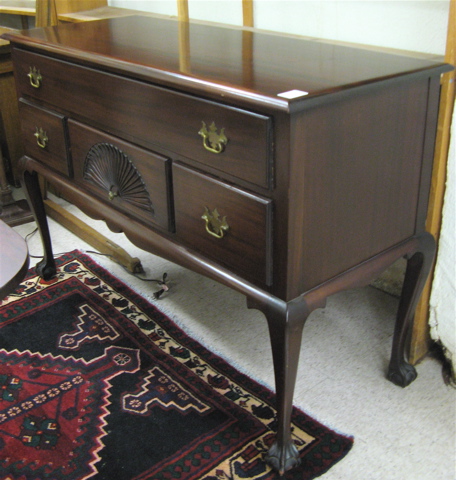 Appraisal: CHIPPENDALE STYLE MAHOGANY BUFFET American mid th century the front