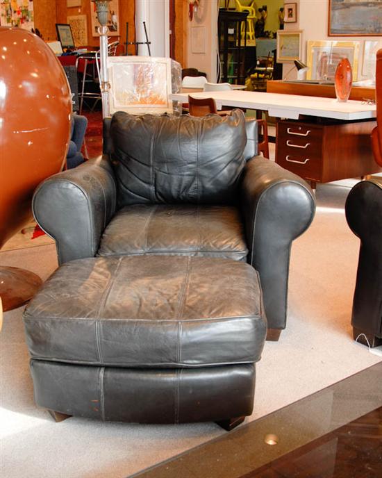 Appraisal: Black Leather Chair and Ottoman contemporary design good condition