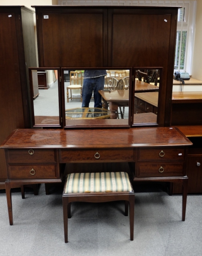 Appraisal: Stag mahogany two door wardrobe triple mirror dressing table and