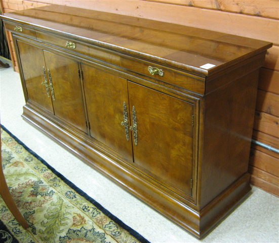 Appraisal: DESIGNER BURL WOOD BUFFET Henredon Furniture Co model the front