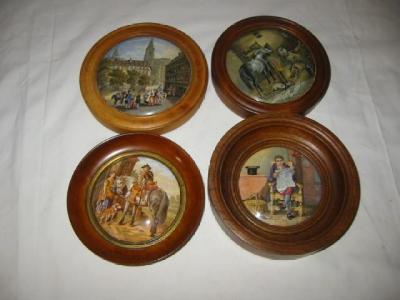 Appraisal: A SET OF FOUR PRATTWARE POT LIDS 'Country Quarters' wide