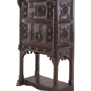 Appraisal: A Gothic Revival Carved Walnut Cabinet on Stand Late th