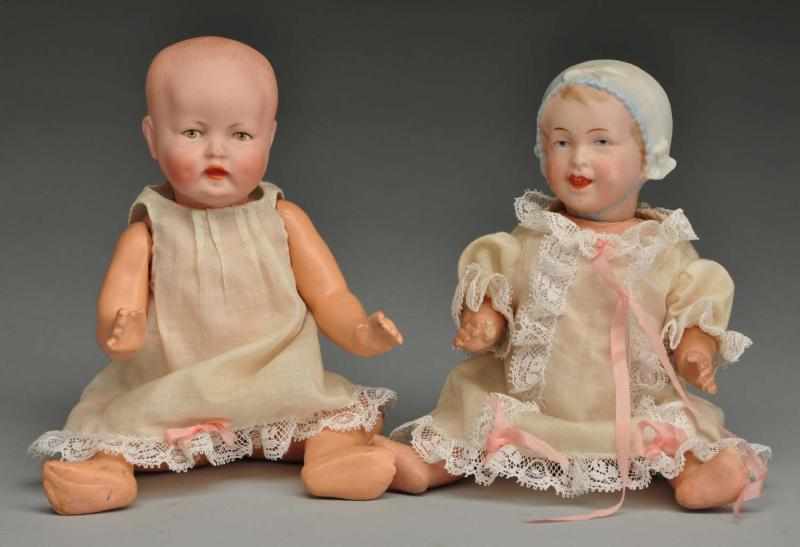 Appraisal: Lot of Character Babies Description Both with bisque socket heads