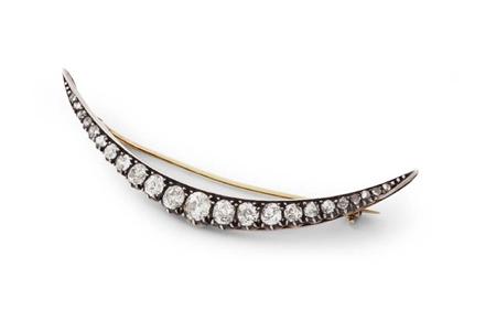 Appraisal: A Victorian diamond set brooch of open crescent form set