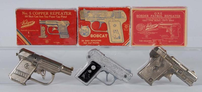 Appraisal: Lot of Kilgore Cap Guns Description Two guns are cast