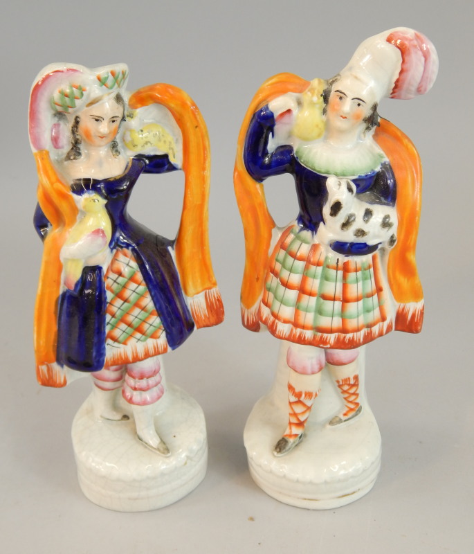 Appraisal: A pair of thC Staffordshire flatback figures in the form