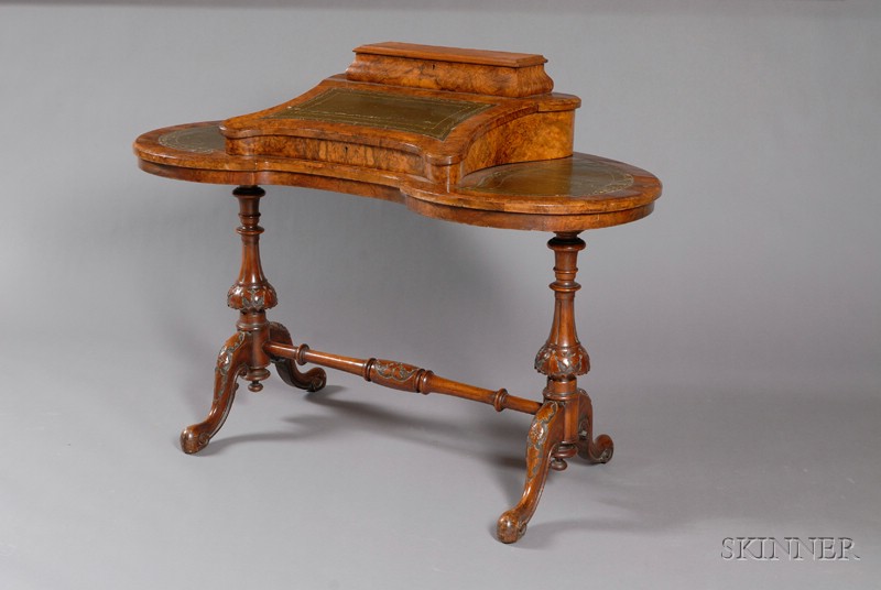 Appraisal: Victorian Carved Walnut Kidney-shaped Writing Table mid- th century superstructure