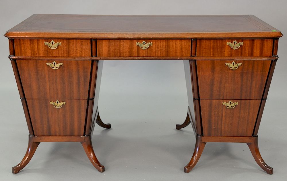 Appraisal: Mahogany desk with red tooled leather top having center drawer