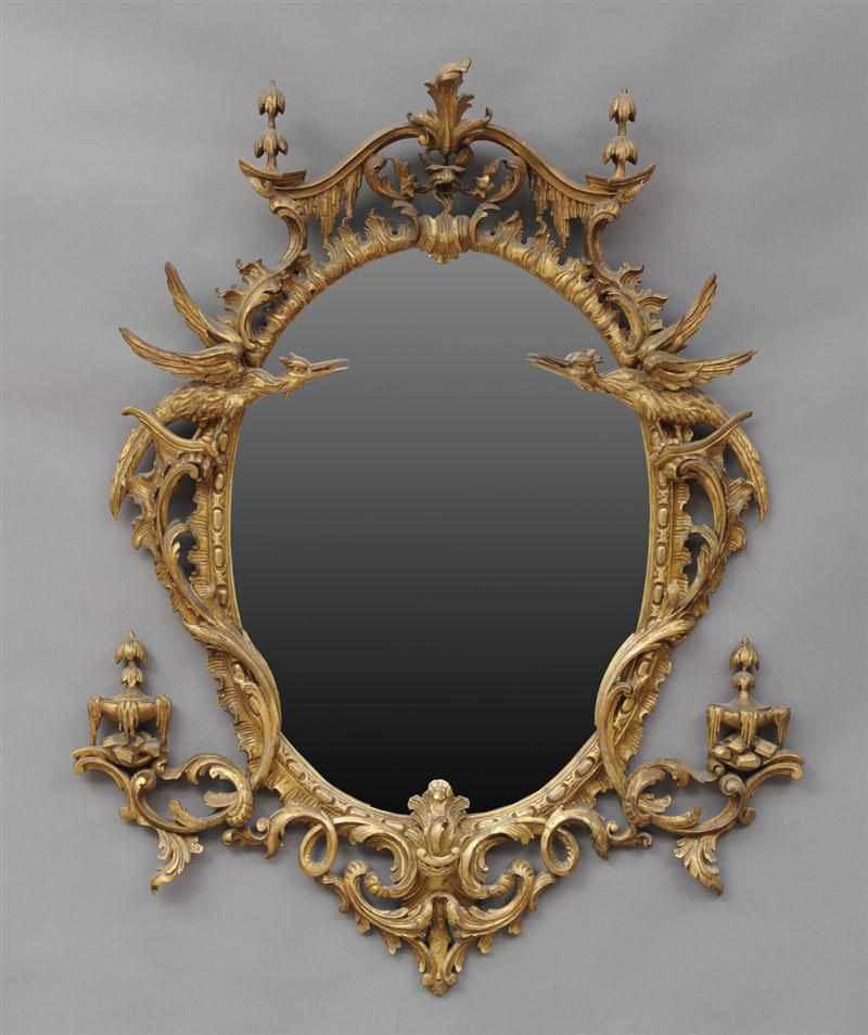 Appraisal: CHINESE CHIPPENDALE STYLE CARVED GILTWOOD MIRROR The oval plate within