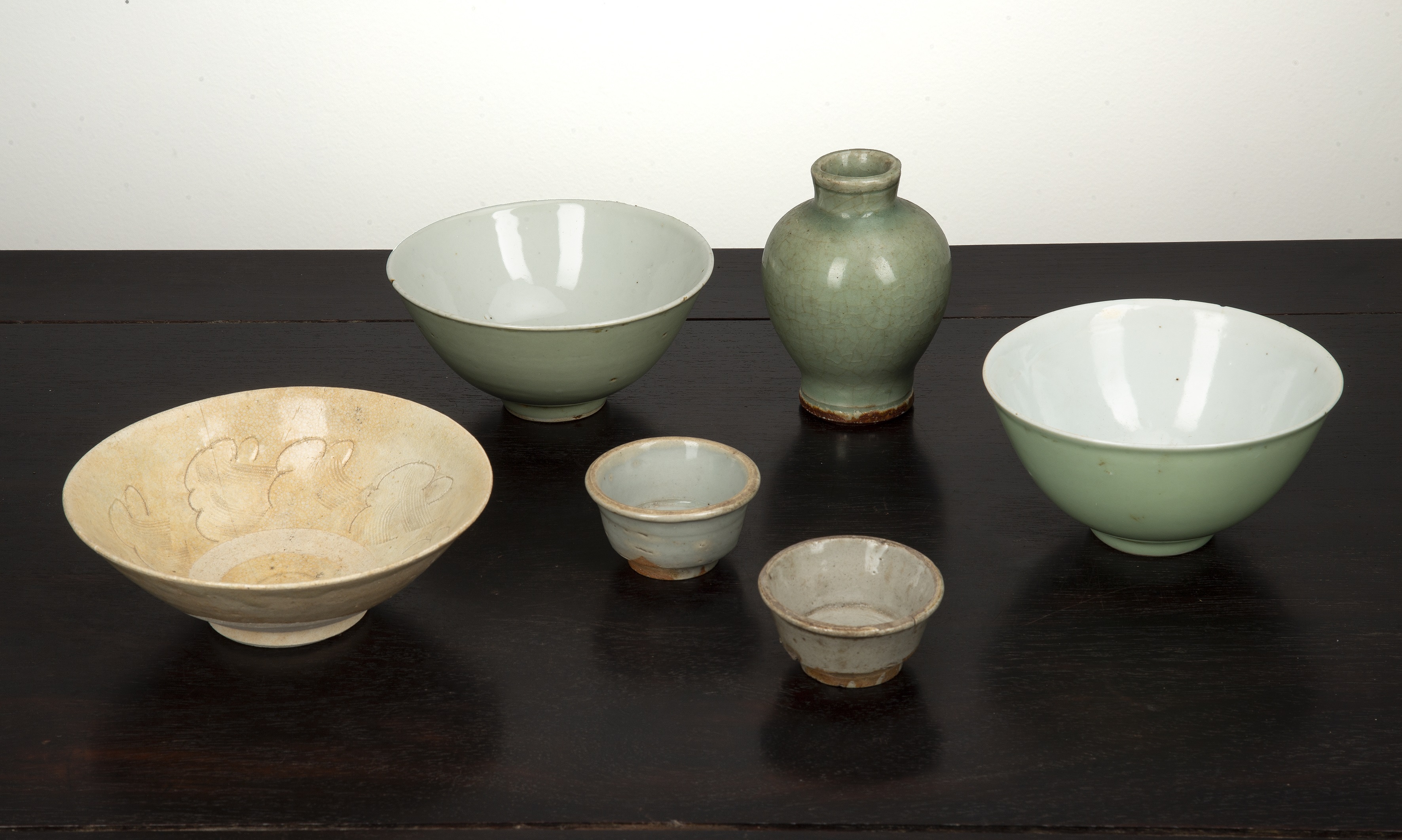 Appraisal: Group of piecesChinese including a Dingyao bowl with incised decoration