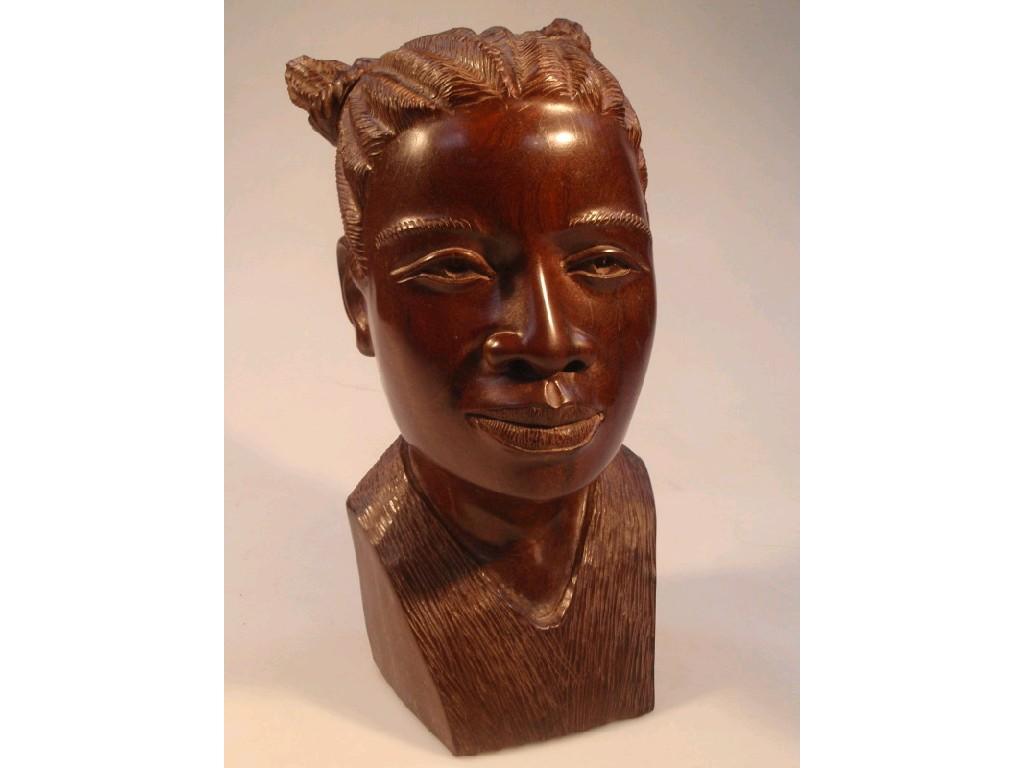 Appraisal: A Central African hardwood bust of a tribes woman with