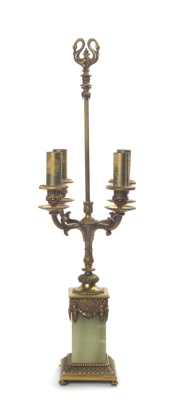 Appraisal: Sale Lot A Neoclassical Gilt Bronze and Onyx Four-Light Candelabrum