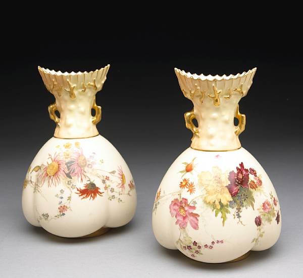 Appraisal: A pair of Royal Worcester blush ivory porcelain vases circa