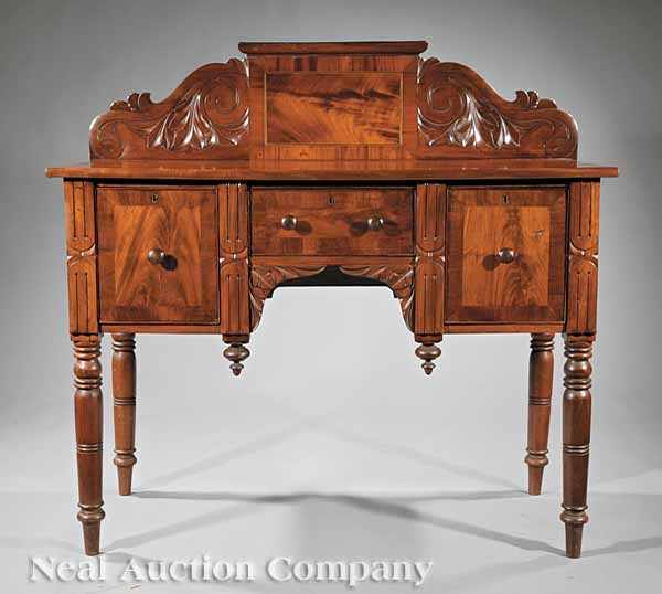 Appraisal: A West Indies Late Classical Carved Mahogany Brandy Board mid-