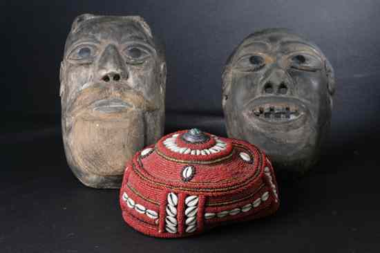 Appraisal: TWO AFRICAN MASKS Together with one hat - Larger in