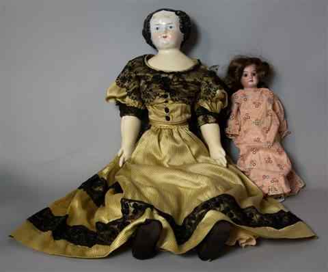 Appraisal: TWO DOLLS INCLUDING A LARGE CHINA HEAD DOLL in dressed