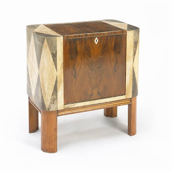 Appraisal: An Art Deco small cocktail cabinet circa parchment clad walnut