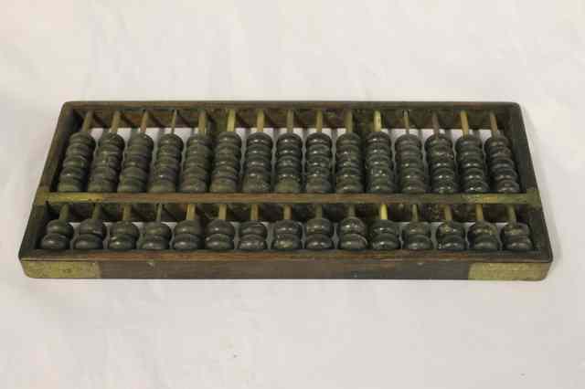 Appraisal: A CHINESE HARDWOOD AND PORCUPINE QUILL ABACUS across