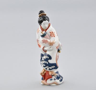 Appraisal: A Porcelain Kakiemon Bijin The young beauty wearing a white