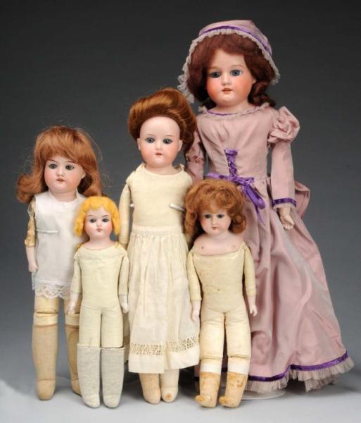 Appraisal: Lot of German Bisque Shoulder Head Dolls Description Largest is