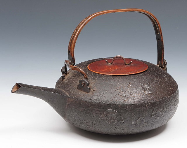 Appraisal: A Japanese iron saki kettleEdo periodwith chi dori waterbirds to