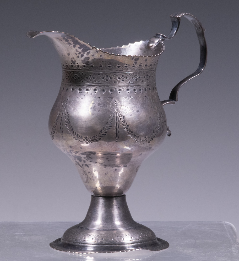 Appraisal: GEORGE III STERLING JUG English Sterling Silver Footed Milk Jug