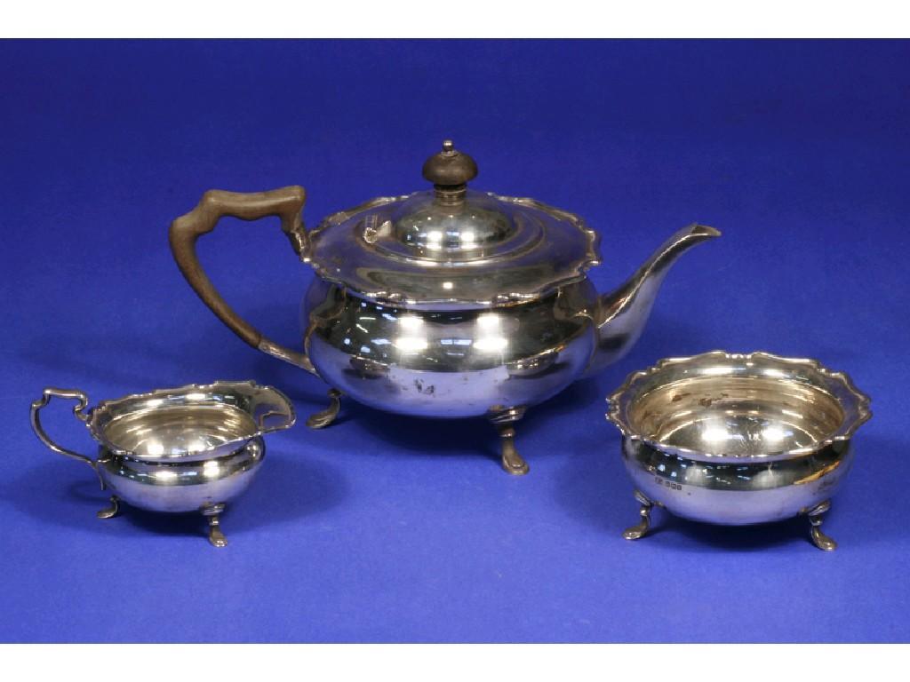 Appraisal: AN EDWARDIAN THREE PIECE TEA SET of bellied circular form