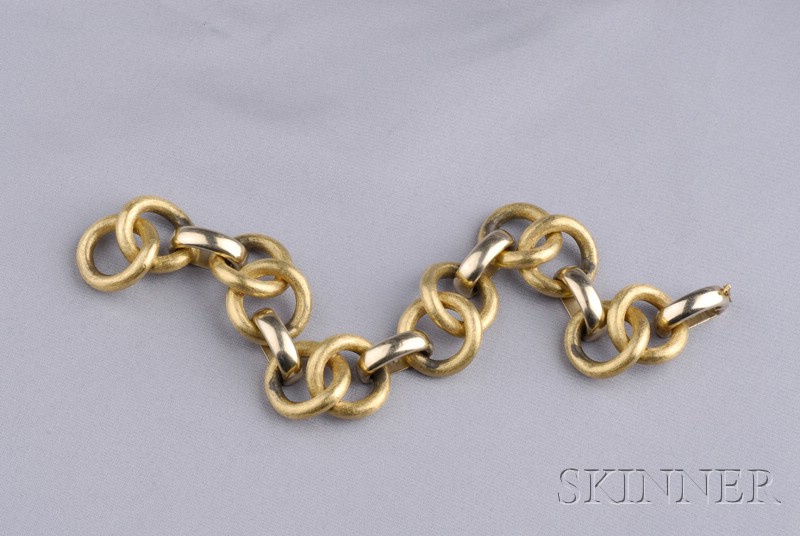 Appraisal: kt Bicolor Gold Bracelet of circular links with Florentine finish