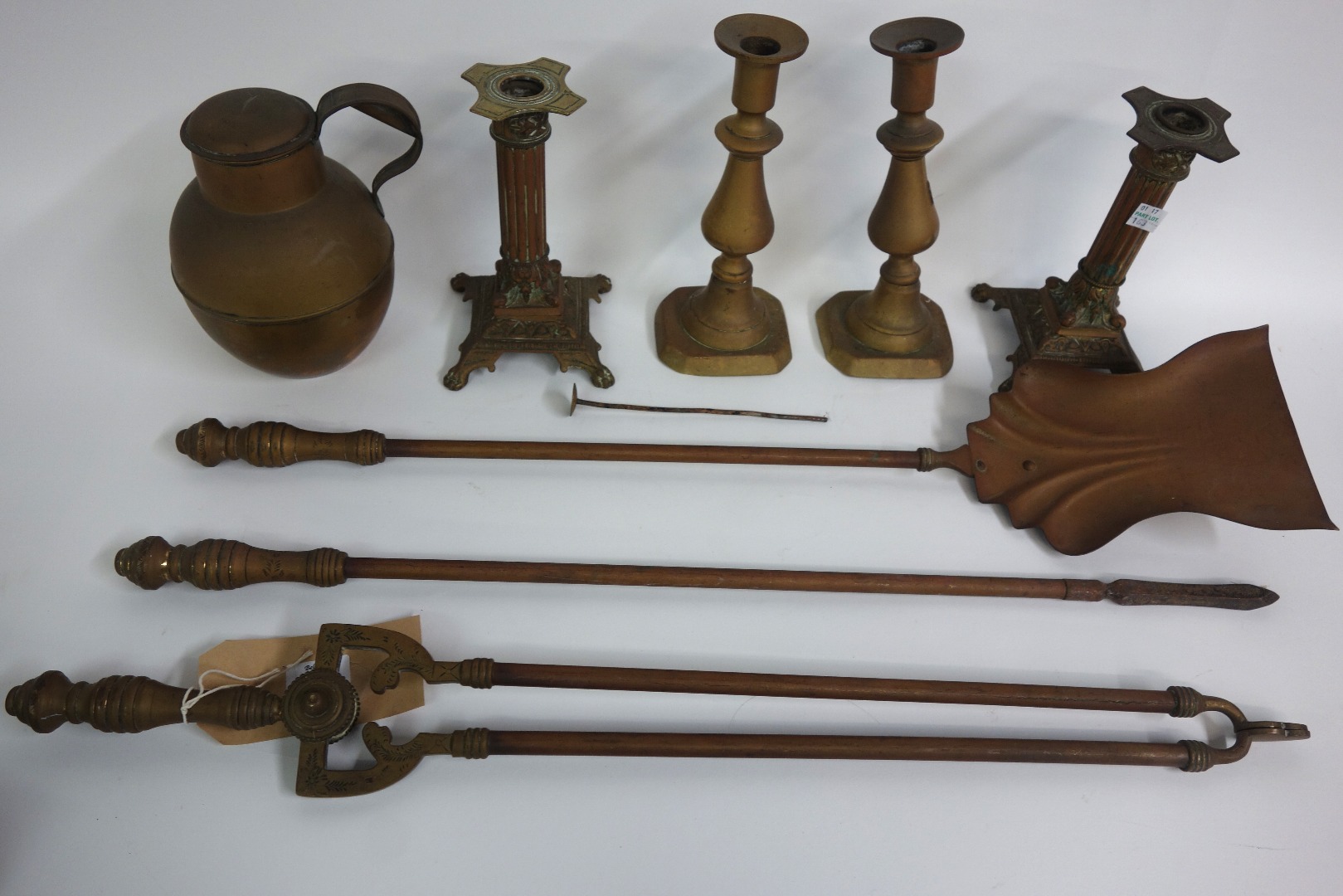 Appraisal: A set of three late Victorian brass fire tools with