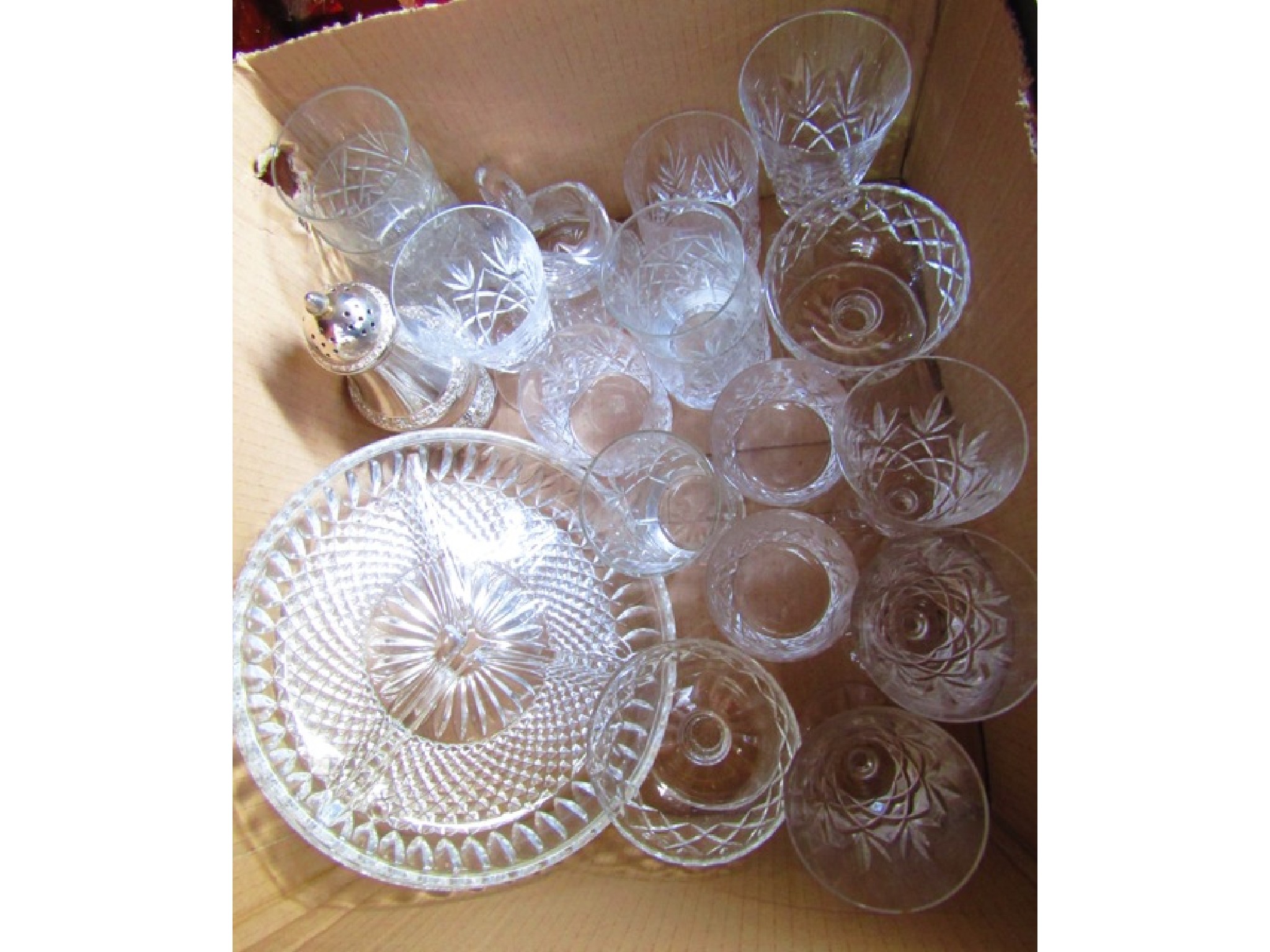 Appraisal: A box containing a selection of various drinking glasses liquours