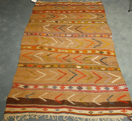 Appraisal: Persian Tribal Rug with brown background and geometric design L