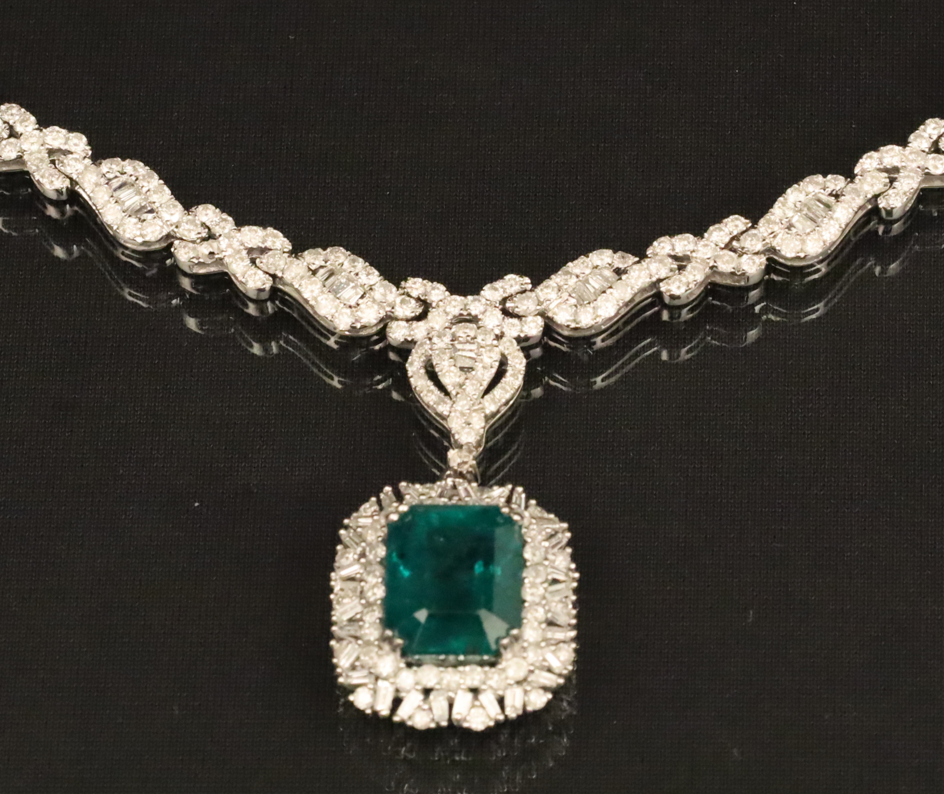 Appraisal: K WHITE GOLD EMERALD AND DIAMOND NECKLACE K white gold