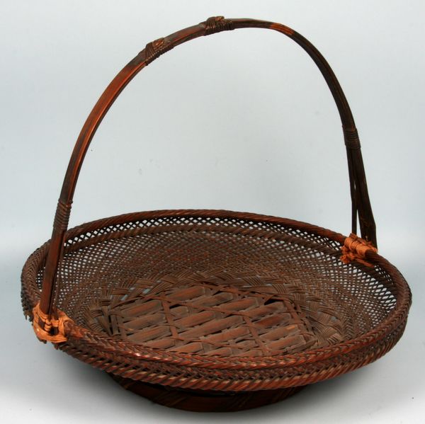 Appraisal: Old Japanese Ikebana basket with bayle handle h x w