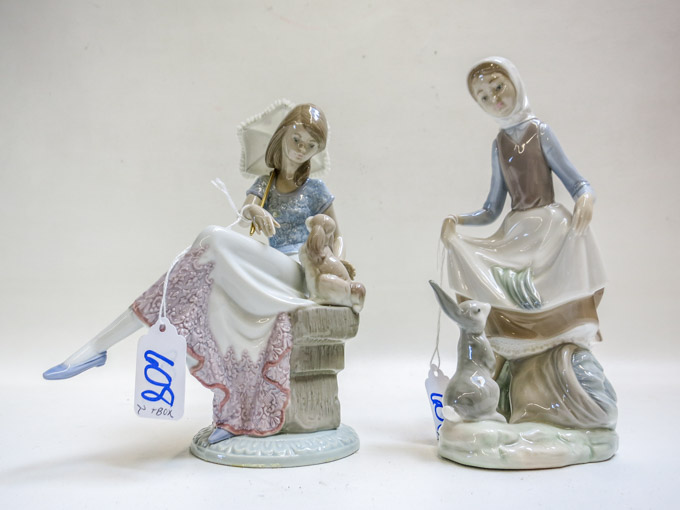 Appraisal: TWO LLADRO PORCELAIN FIGURINES Picture Perfect by sculptor Juan Huerta