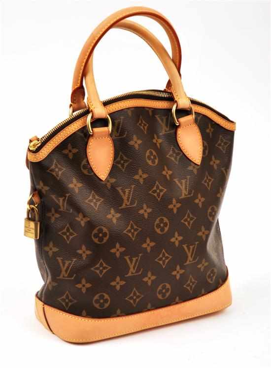 Appraisal: A LOCKIT HANDBAG BY LOUIS VUITTON Styled in monogram canvas