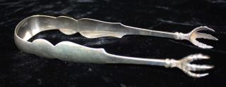 Appraisal: Silver chicken claw sugar tongs probably coin silver Hallmark D