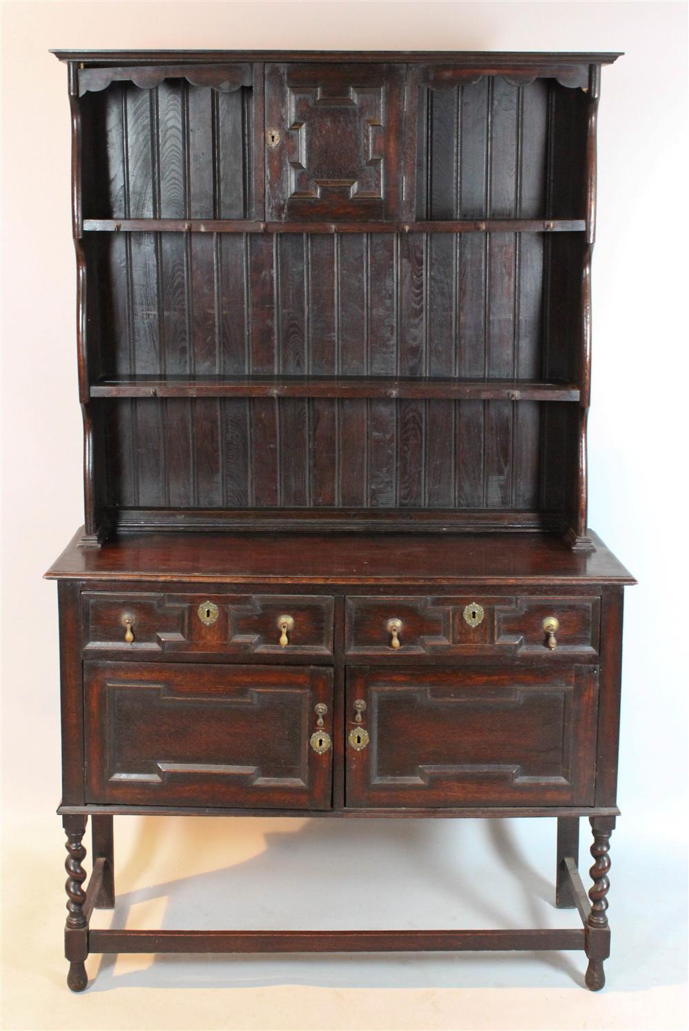 Appraisal: WELSH STYLE OAK CUPBOARD AND SHELVES early th Century the