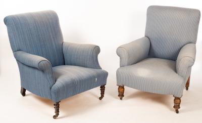 Appraisal: A pair of upholstered armchairs on turned front legs