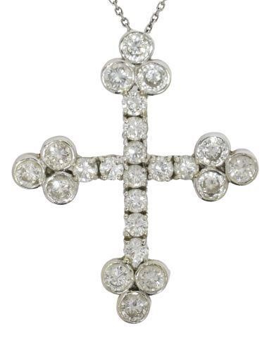 Appraisal: Estate kt white gold diamond cross pendant on delicate kt