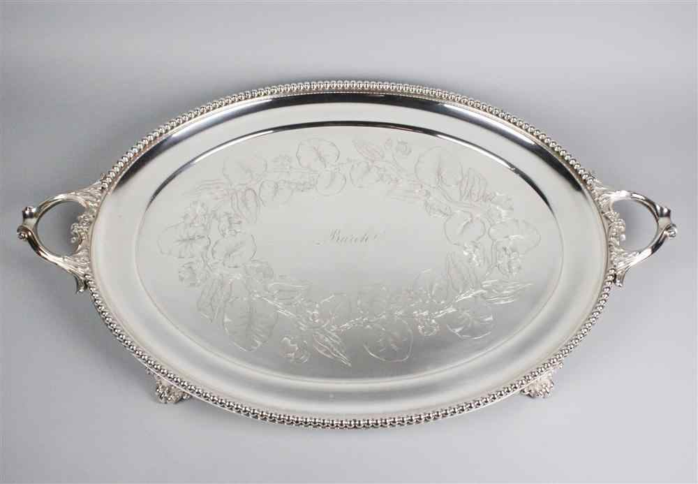 Appraisal: MASSIVE SILVERPLATED TWO-HANDLED OVAL TRAY with central inscription 'Burch' with