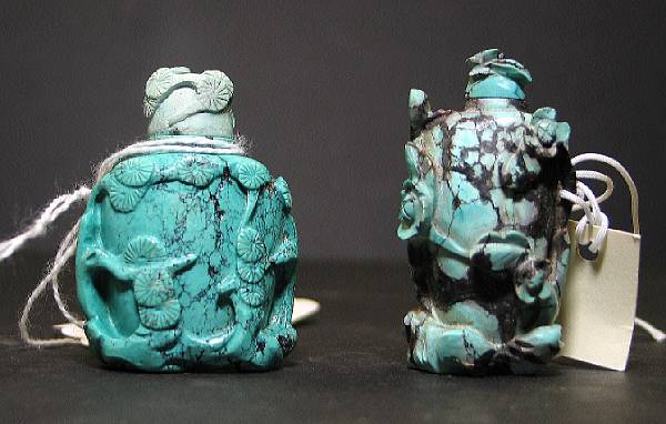 Appraisal: Five snuff bottles The first decorated with relief carving of