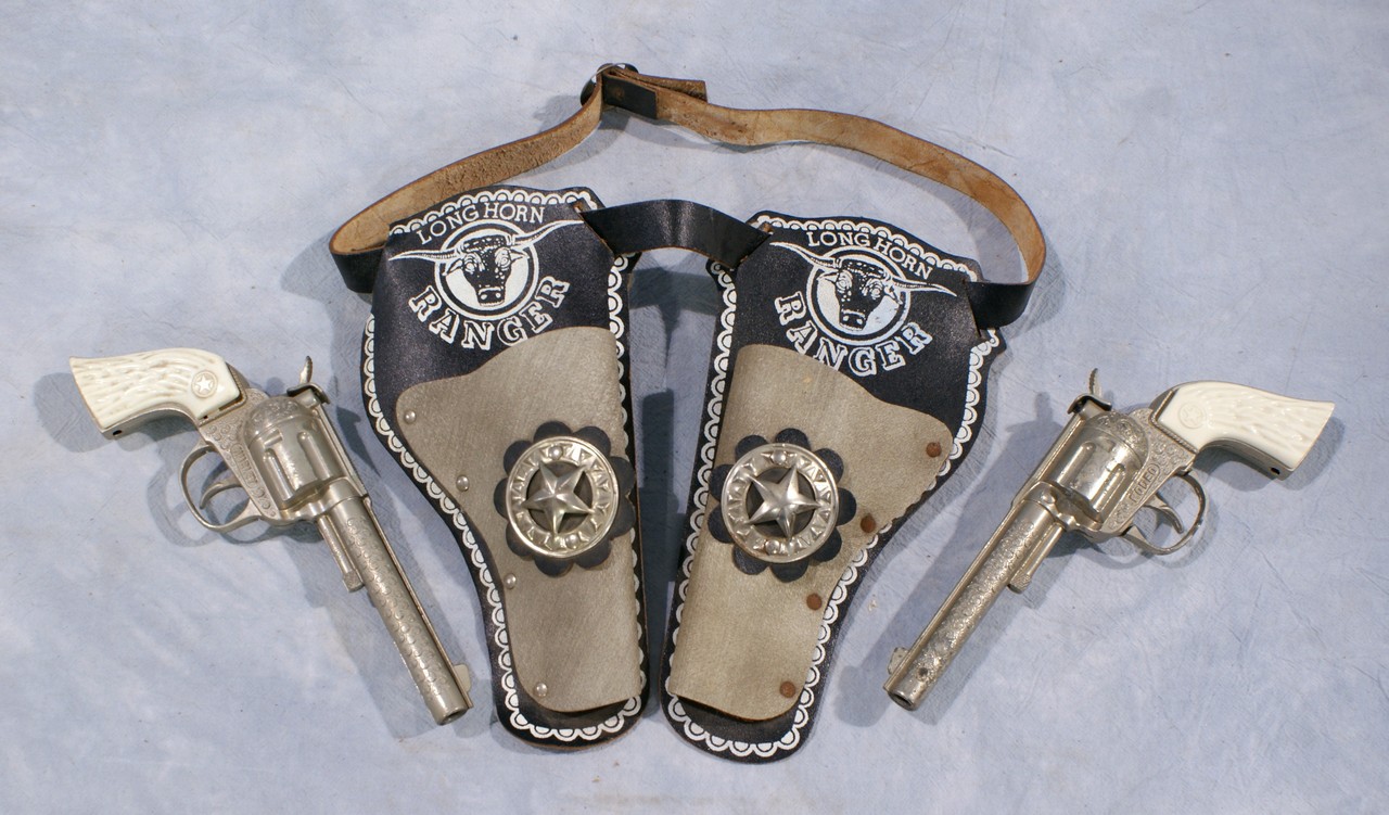 Appraisal: Long Horn Ranger double holster with Hubley Rodeo cap guns